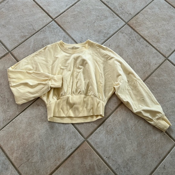 Pale Yellow Lululemon Cropped Crew Neck with Synched Waist and Cuffs - Picture 2 of 5